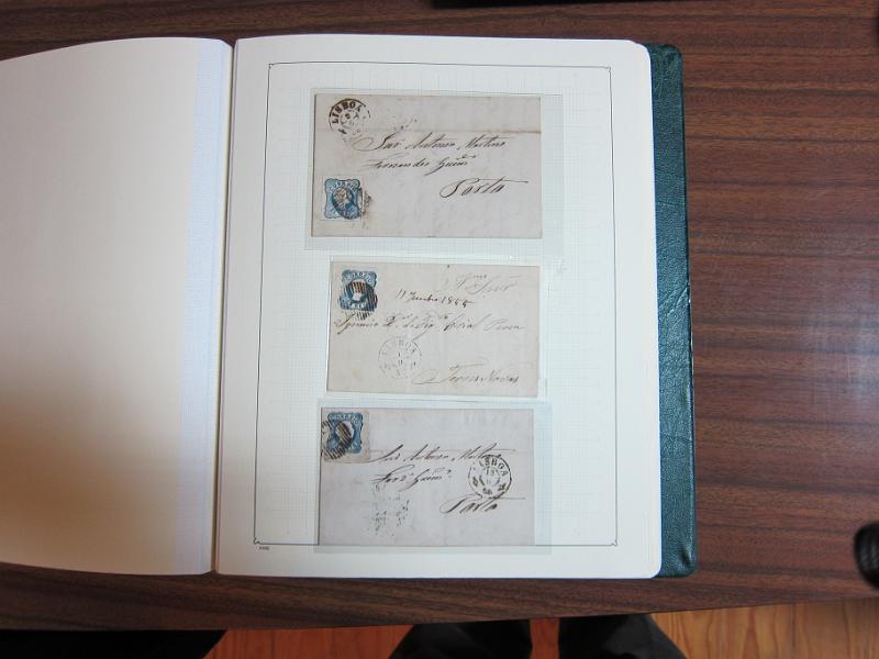 0013 (91).JPG -     Lote:    13      Marcofilia      Lotes Especiais       Descrição:      Portugal.   Colecção especializada em dois álbuns com estudo especializado das marcas de suplo círculo e circulares de Lisboa, com selos de diversas emissões e cartas. Lote a ver.        Lote       Valor Base:     &euro; 1.500,00     Valor Venda:     Retirado     